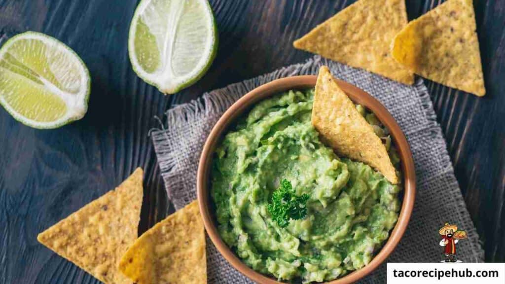 Bowl of guacamole served with crispy tortilla chips